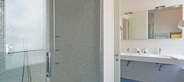 Suite family room large bathroom with rain shower